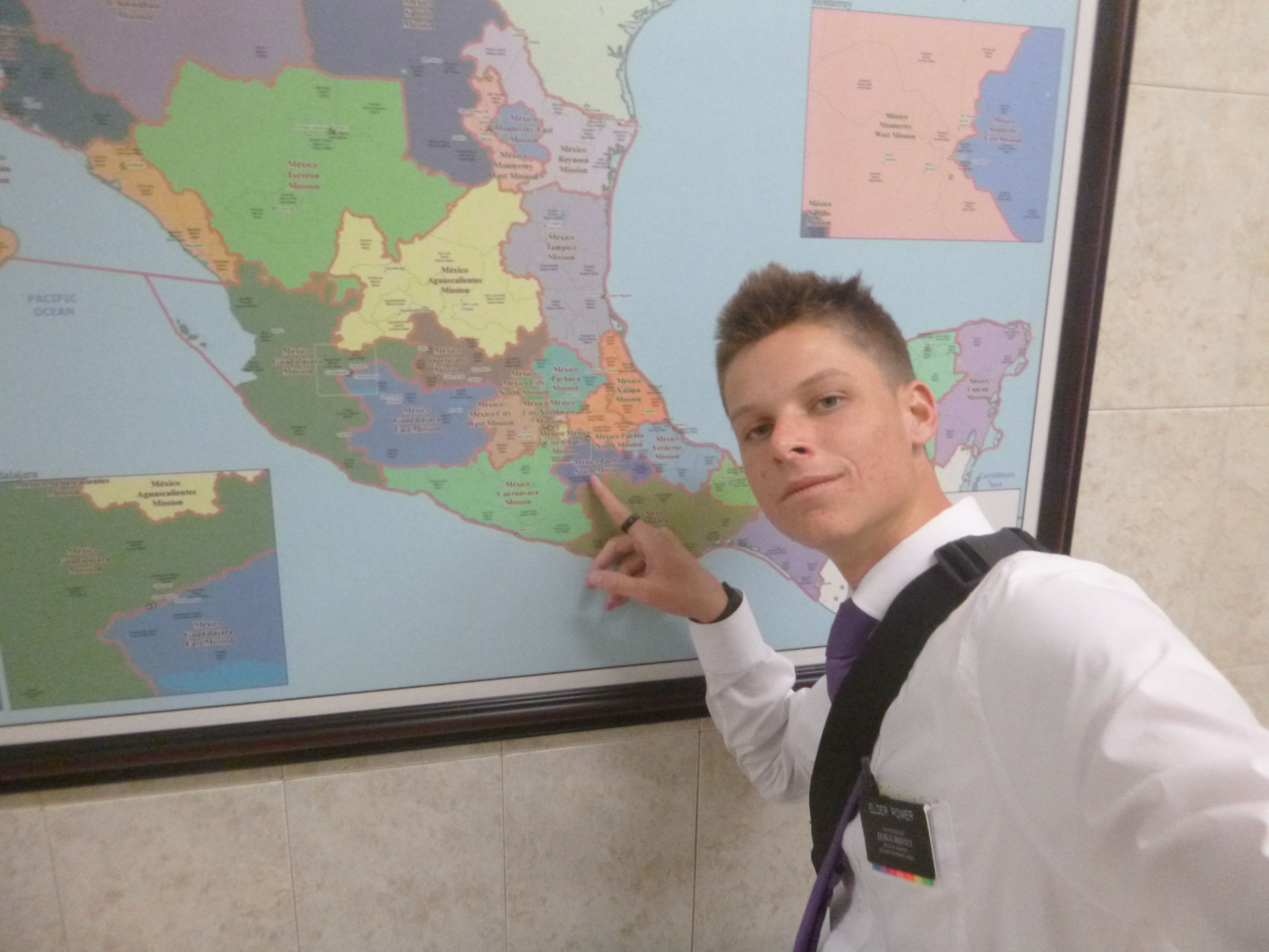 A picture of me in the MTC pointing at Puebla.